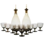 Orrefors decanter and wine glass set, circa 1960, the decanters with spike stoppers and grey brown