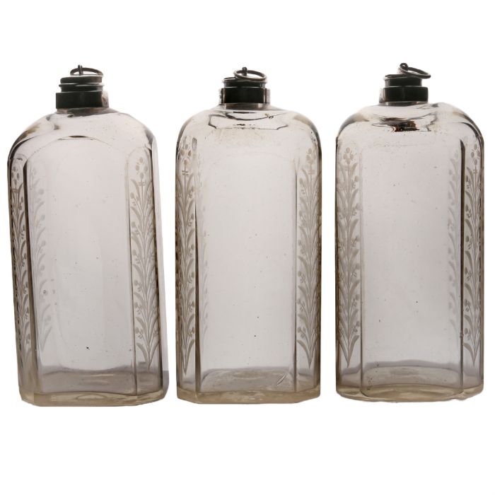 A set of three 18th Century Bohemian flasks, circa 1760, rectangular bodies with canted angles and