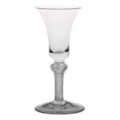 A mid 18th Century multi spiral air twist wine glass, English circa 1750, bell bowl with solid