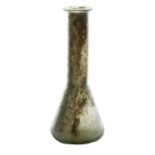 A Roman conical flask, 2nd - 3rd Century AD with a thick collar rim above the bell shaped base, 15.