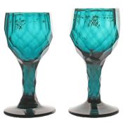A pair of 18th Century Russian green coloured wine glasses, circa 1780, facet cut with gilt