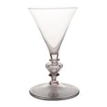 A 17th Century Facon de Venice wine glass, probably French or Low Countries, a hollow ribbed knop