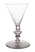 A 17th Century Facon de Venice wine glass, probably French or Low Countries, a hollow ribbed knop