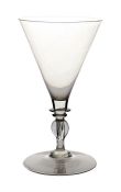 A 17th Century Facon de Venice wine glass, four bladed central knop below a double merise, 15.5cm