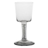 An 18th Century glass goblet, English circa 1760, with a double series opaque twist with bucket