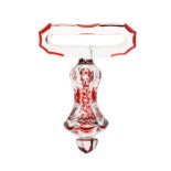 A mid 19th Century Bohemian glass bell pull, red stained decoration under clear glass, 17.5cm high