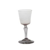 An 18th Century French wine glass, circa 1750, bucket bowl with inverted baluster stem and folded