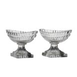 A pair of 19th Century salts, Irish circa 1800, boat shaped with "lemon squeezer" feet, 8cm high, (