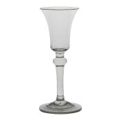 A mid 18th Century baluster wine glass, English circa 1740, with a bell bowl above a knop and