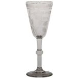 An early 19th Century glass, The Immortal Memory engraved to the bowl and trailing grape and vine