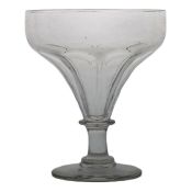 A 19th Century English glass capstan stem toddy rummer, circa 1830, the tapering bowl above a ring