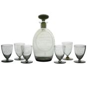 Sir Laurence Whistler CBE (1912-2000) an early rare glass decanter and stopper and six glasses,