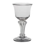 A mid 18th Century goblet, English circa 1740, the everted ogee bowl above a Silesian stem and
