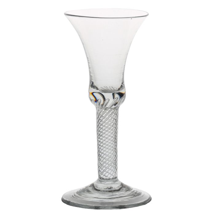 A mid 18th Century multi spiral air twist wine glass, English circa 1750, the bell bowl with