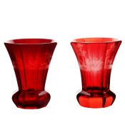 Two mid 19th Century Bohemian ruby glass flared beakers, the first engraved with horses, stags and