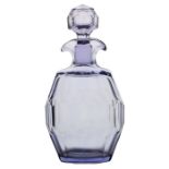 A mid 19th Century lilac blue decanter and stopper, with a double pouring spout and faceted body,