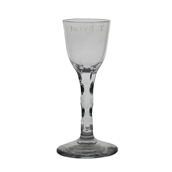 18th century English facet stem wine glass, circa 1770, engraved T. Bycot, 14.5cm tall The Cycle