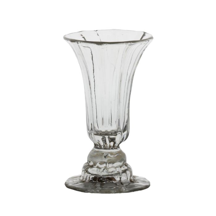 An 18th Century helmet foot syllabub glass, circa 1760, with a ribbed body and helmet foot, the