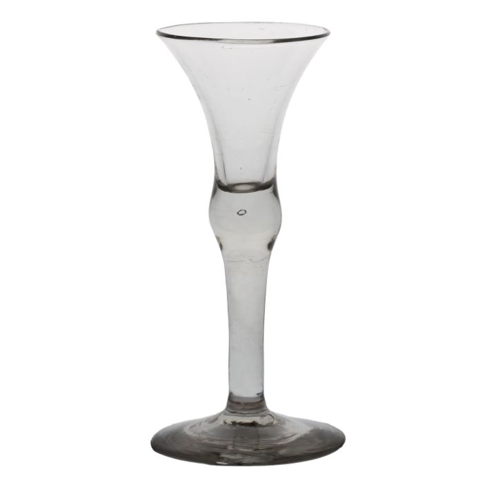 A mid 18th Century multi spiral air twist wine glass, English circa 1740, the bell bowl above a