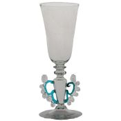 A Venetian glass wine flute, circa 1900, hollow stem with light blue wings, 20.5cm high