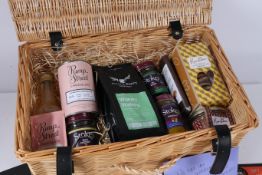 A food hamper to include Chutney's, biscuits etc together with various vouchers to include Applaud