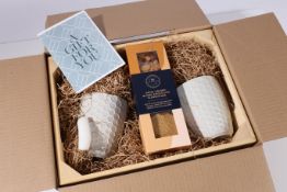A Marks & Spencer's tea biscuits and honey hamper   We would like to thank Miller Insurance for this
