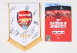 A signed Arsenal Football Club pennant, with certificate of authenticity, 27cm high We would like to