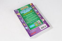 A Pokemon super extra deluxe essential handbook We would like to thank Miller Insurance for this lot