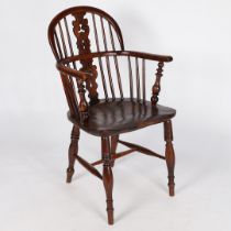 A GEORGE III YEW AND ELM WINDSOR CHAIR.