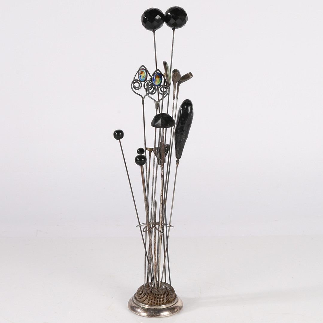 GEORGE V SILVER HAT PIN STAND AND THIRTEEN HAT PINS (14).
