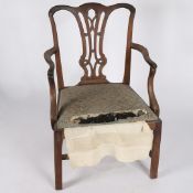 A GEORGE III MAHOGANY CHIPPENDALE STYLE ARMCHAIR.