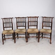 A SET OF EIGHT 19TH CENTURY OAK SPINDLE BACK CHAIRS.