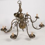 LARGE BRASS EIGHT BRANCH CHANDELIER WITH SCROLLING BRANCHES.