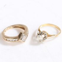A 9 CARAT GOLD AND C/Z RING, A YELLOW METAL AND CLEAR PASTE SET RING (2).