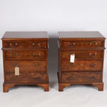 A PAIR OF 20TH CENTURY WALNUT CHEST OF DRAWERS.