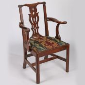 A GEORGE III CHIPPENDALE STYLE MAHOGANY ARMCHAIR.