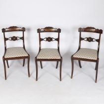 A SET OF THREE REGENCY ROSEWOOD AND BEECH AND BRASS INLAID CHAIRS.