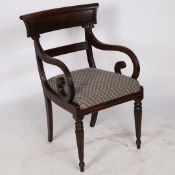 A REGENCY FLAME MAHOGANY ARMCHAIR.