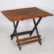 A EARLY 20TH CENTURY BAMBOO TOPPED FOLDING TABLE.