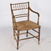 A 19TH CENTURY ARMCHAIR.