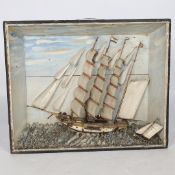 A LATE 19TH/EARLY 20TH CENTURY DIORAMA DEPICTING A THREE MAST SAILING SHIP ON A STORMY SEA.