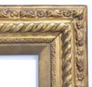 18th century carved and dragooned picture frame - rebate size 21in x17in