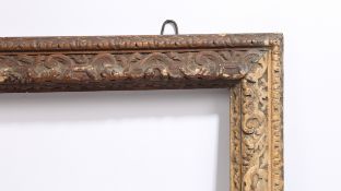 19th century carved picture frame with intricate decoration (uncoloured) - rebate size 25in x 16in