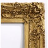 19th century heavily patterned swept picture frame with corners and centres - rebate size 24in x