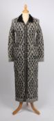 A Chanel geometric knitted wool long cardigan coat with CC logo buttons, size 34.