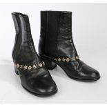 A pair of Chanel black leather Chelsea style ankle boots with diamante and white metal studs. Size