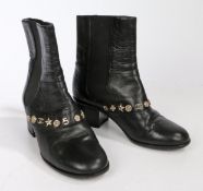 A pair of Chanel black leather Chelsea style ankle boots with diamante and white metal studs. Size