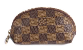 A Louis Vuitton coin purse, of arched form with chequerboard leather body and gilt zip, 13cm wide,