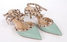 A pair of Valentino 'Rockstud' turquoise leather studded heels. Size 35.5