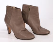 A pair of Jimmy Choo taupe leather mid-heel ankle boots, size 35.5.